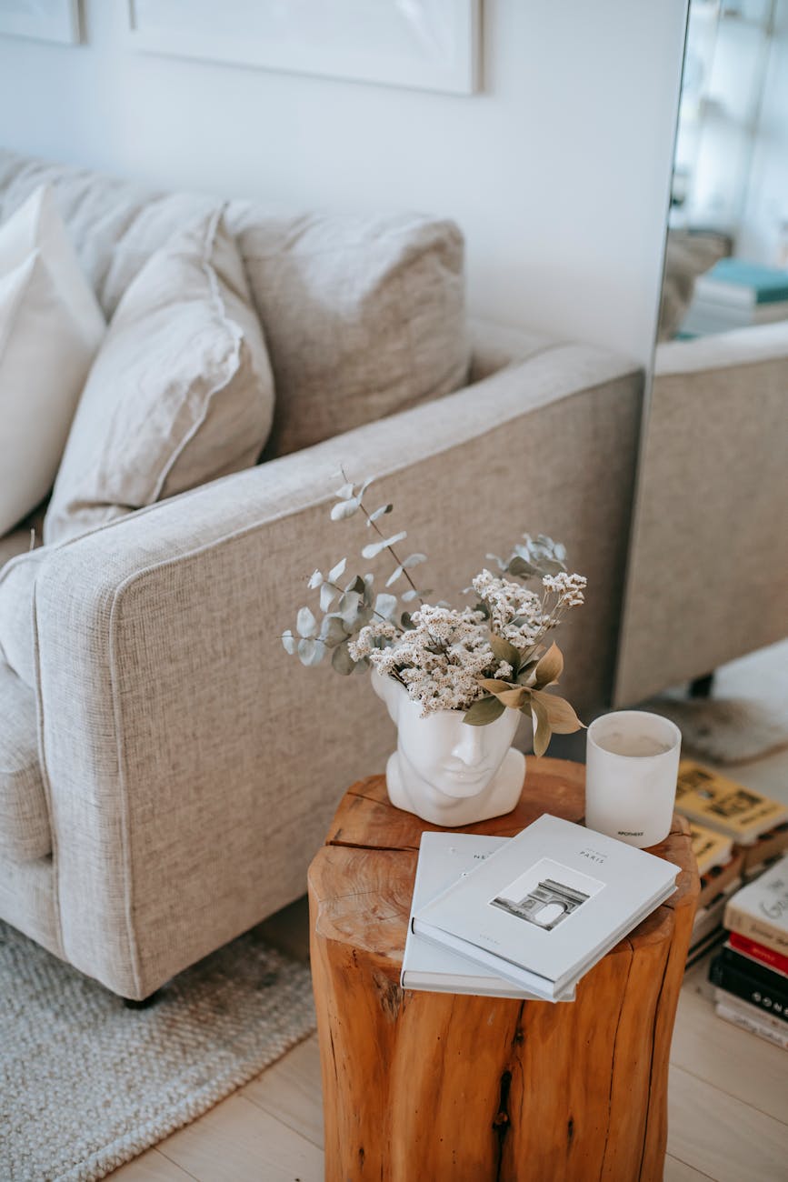 living room interior with furniture and flowers in vase